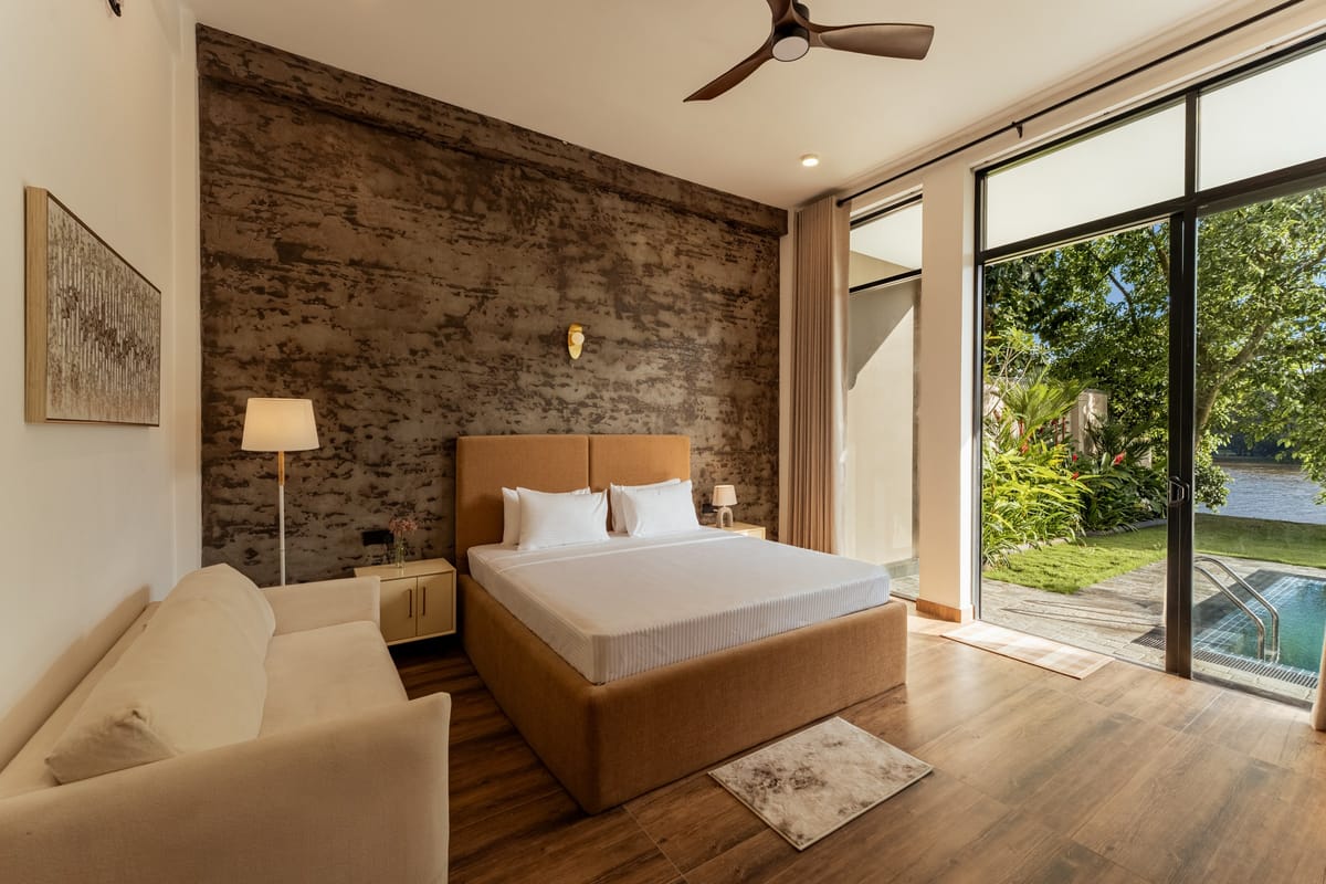Pool View Room 2 and its French window onto the lawn