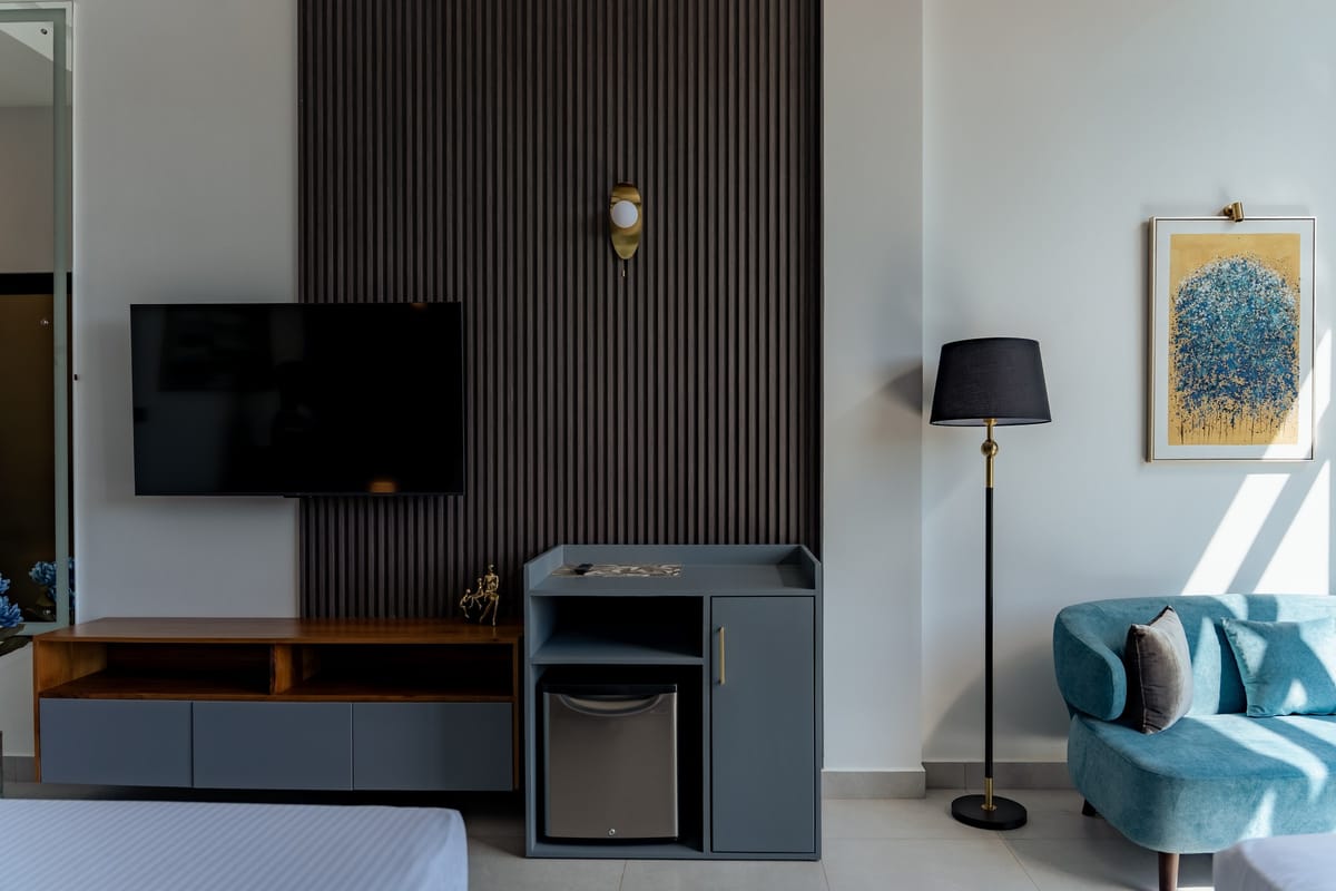 River View Room 1, TV corner and armchair