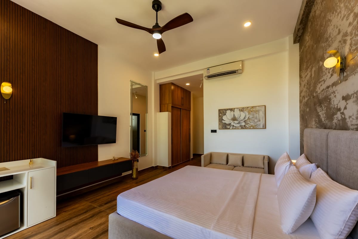 River View Room 3, wooden wall and sofa
