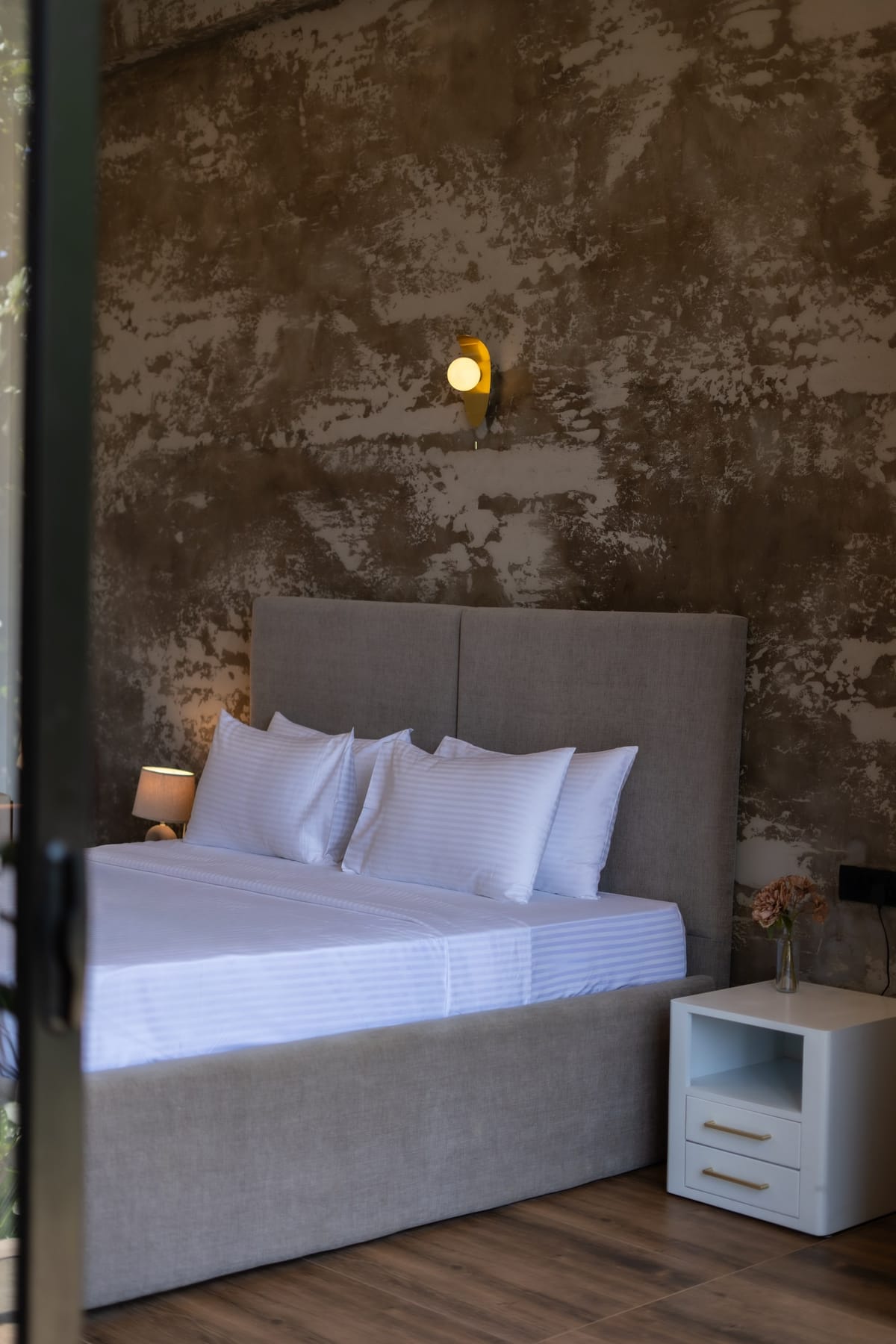 River View Room 3, bed and accent wall